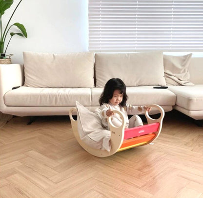 Cama mecedora de madera para niños